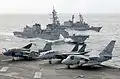 JS Hamagiri alongside USS Kitty Hawk and JS Ariake on 16 November 2002.