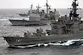 US Navy 070318-N-5961C-262 Japan Maritime Self Defense Force (JMSDF) ship JS Haruna (DDH-141), USS Lake Champlain (CG-57) and USS Russell (DDG-59) steam in formation during a photo exercise