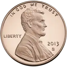 A 2013 one-cent coin from the United States (valued at 1/100 of a dollar), known colloquially as a penny.