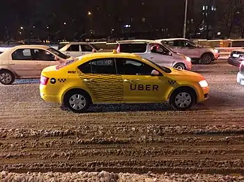 Yellow Uber car in Moscow