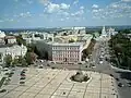 View of the monument on Sophia Square (Sofiiska Ploshcha), behind it stands the "Prisutstvinyie mesta" building