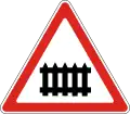 Railroad crossing with gates or barriers