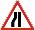 Road narrows on the left