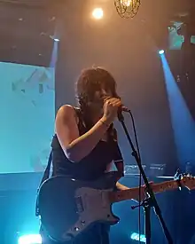 Grey performing in October 2023