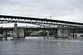 The bridge viewed from the east, with Ship Canal Bridge in the background.