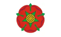 Unofficial version of the Lancashire flag with a white background, commonly used before the adoption of the current version.