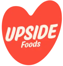 Pink orange heart with Upside Foods written inside with a thick marker font