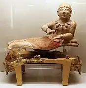 Smaller Urn that has similar proportions like the Sarcophagus of spouses