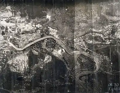 The 3rd Aerospace Rescue Recovery Group used this mosaic reconnaissance photograph to plan Lt. Col. Hambleton and 1st Lt. Mark Clark's rescue. The Cam Lo Bridge is shown at the far left. On 7 April, Hambleton was about 1,000 yards (910 m) above the river and Clark was near the river.: 76 