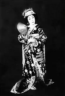 Nakamura Utaemon VI in costume for a female kabuki role in Musume Dōjōji, 1951.