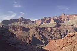 View of Tonto Group, in descending order: Muav Limestone, Bright Angel Shale, and Tapeats Sandstone, overlying the Great Unconformity cut into Vishnu Basement Rocks in Granite Gorge region.