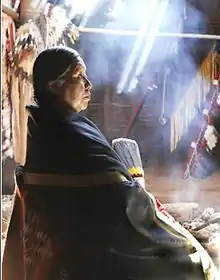 photograph of Vanessa Jennings taken in 1989 inside her earth lodge