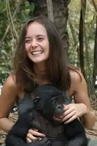 Vanessa Woods with a bonobo at Lola ya Bonobo Sanctuary in DRC.