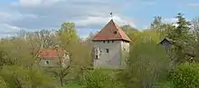 Vao castle, with the protruding latrine visible on the left side of the building