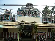 Southern entrance of the temple showing gated building