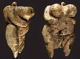 Two views of the Venus of Hohle Fels figurine, 40,000 BC-35,000 BC (6 cm (2.4 in) tall), one of the earliest known, undisputed examples of a depiction of a human being