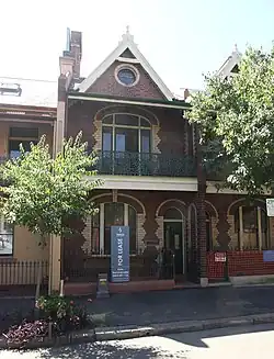 Vermont Terrace, Millers Point (1891). An early, fairly groundbreaking terrace-pair, with polychrome brick and rounded windows. Possibly designed by Morell & Kemp.