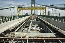 Workers rebuilding the bridge's upper deck