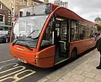 Team Pennine Optare Versa in Halifax town centre in July 2023.