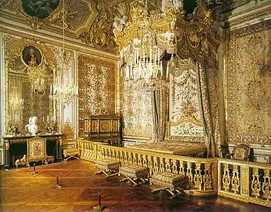 At Versailles, the Chambre de la Reine features the centrally-placed state bed delivered for Queen Maria Leszczinska.