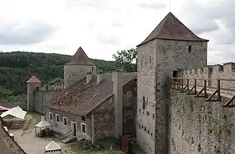 The western enceinte (fortified wall) with horse stable house from inside