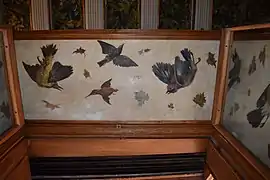 Bird paintings on the dining room jambs