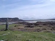 View over Colonsay and Oronsay to the right, the Paps of Jura in the distance