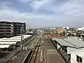 A high-angle view looking south. The bike sheds at the eastern station forecourt are clearly seen.