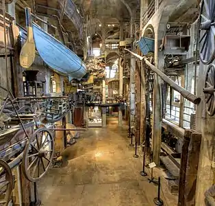 Inside the Mercer Museum. Note the quasi "fun-house" effect with pieces hanging from the ceiling and walls.