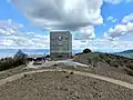 The abandoned radar tower and parking lot