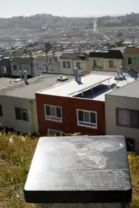 View west to the Excelsior from La Grande Tank, with a "musing stone" from Philosopher's Way in the foreground.