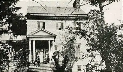 Villa LaRue around 1920. James LaRue Irvin Vanmetre is the man standing at the upper left.