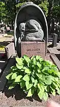 His grave, with a crying angel sculpted by Viivi