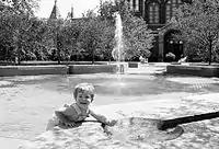 Visitor Playing in Pool of Water