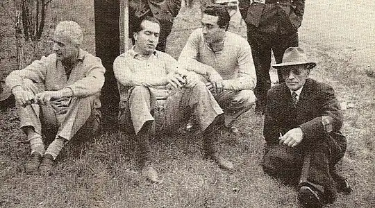 Vittorio Jano, on the far right, with drivers Luigi Villoresi, Alberto Ascari and Eugenio Castellotti.