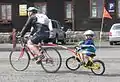 A complete child's bike converted into a trailer bike