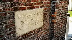 Stone at entrance to Voormezeele Enclosures 1 and 2 Commonwealth War Graves Commission cemeteries