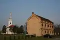 Cooperative's building and Church in the background