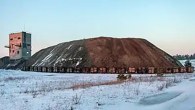 Limestone mound and the abandoned quarry carts