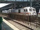 WAP-7 Locomotive outside Mumbai Central Passenger station. As seen from the Suburban station.