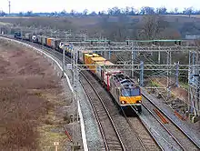 Image 26Freight train with shipping containers in the United Kingdom (from Transport)