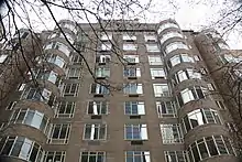 The cylindrical window bays, which are arranged into "bows" facing 54th Street