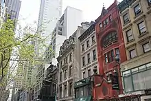 Houses along the restaurant row of 56th Street, looking east, with 30 West 56th Street at center left