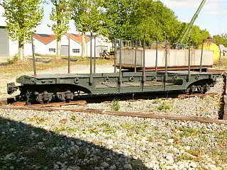 A WW I pocket wagon for transporting artillery shells. A rectangular water tank wagon is in the background.