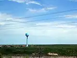 Wanblee, South Dakota, including the town's water tower and some homes