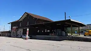 Two-story building with gabled roof