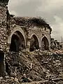 Waqf coffeehouse interior after war damage