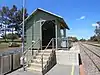 Small platform with metal shelter