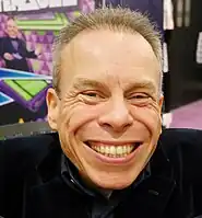 A photograph of Warwick Davis