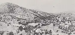 Washington Camp, facing west in 1909. The large mine buildings is the Duquesne Reduction Plant.